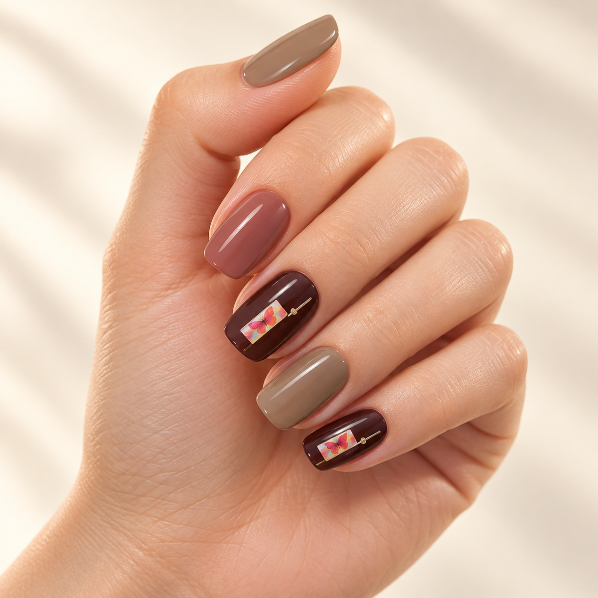 Butterfly Flash holographic nail sticker manicure on a warm ivory background