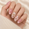French Butterfly cat-eye press-on nail manicure on a warm ivory background